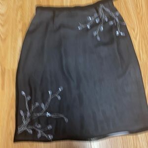 Cest  City Size 6 100% Silk skirt The white lining is 100% Polyester